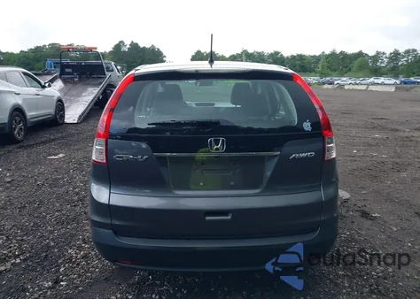 2012 Honda Cr-V Lx z USA, uszkodzony, nr VIN 2HKRM4H32CH624973